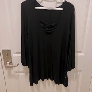 Black criss cross top with flared sleeves